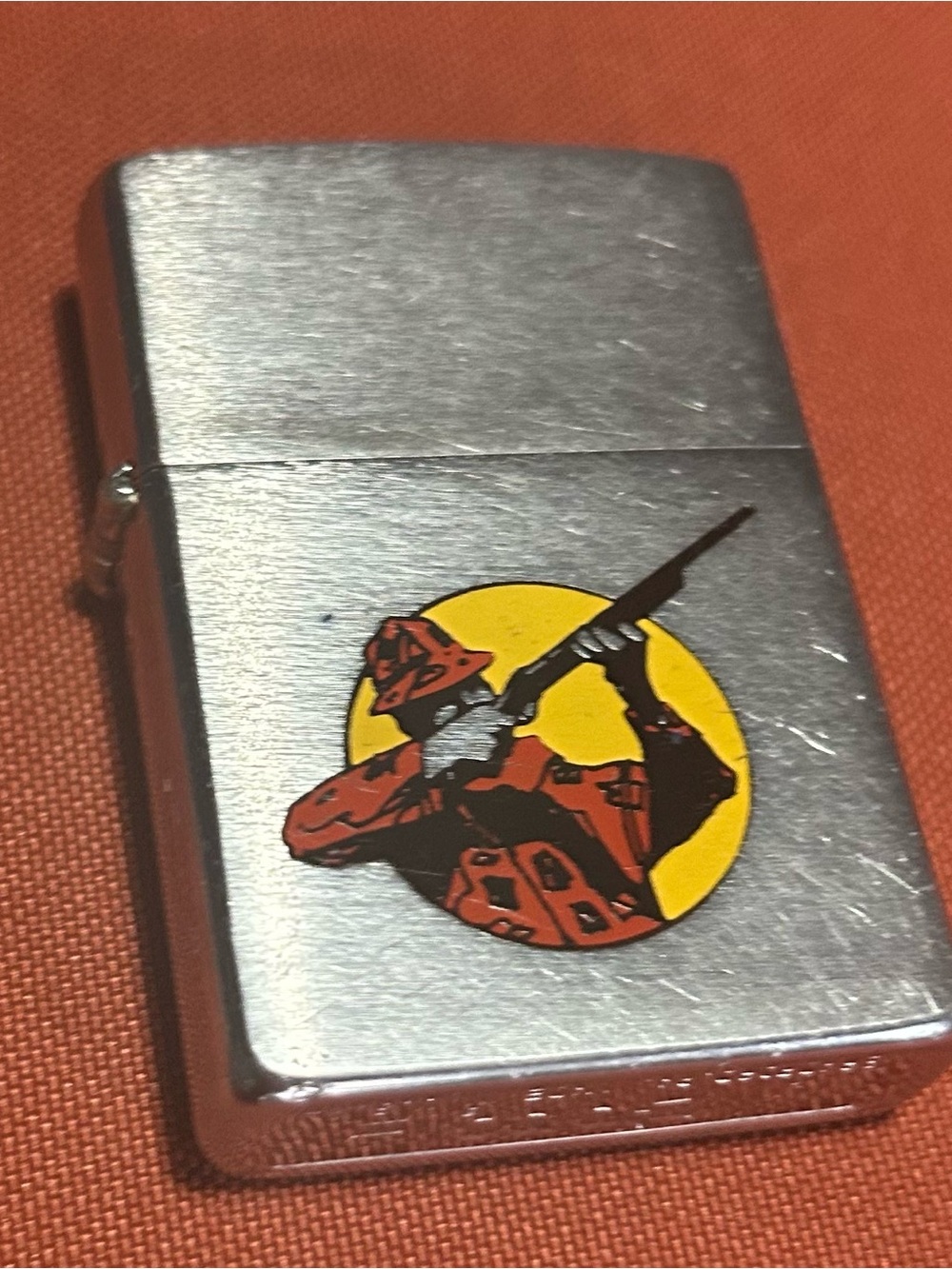 Vintage Silver Metal Lighter with Yellow & Orange Hunter Graphic